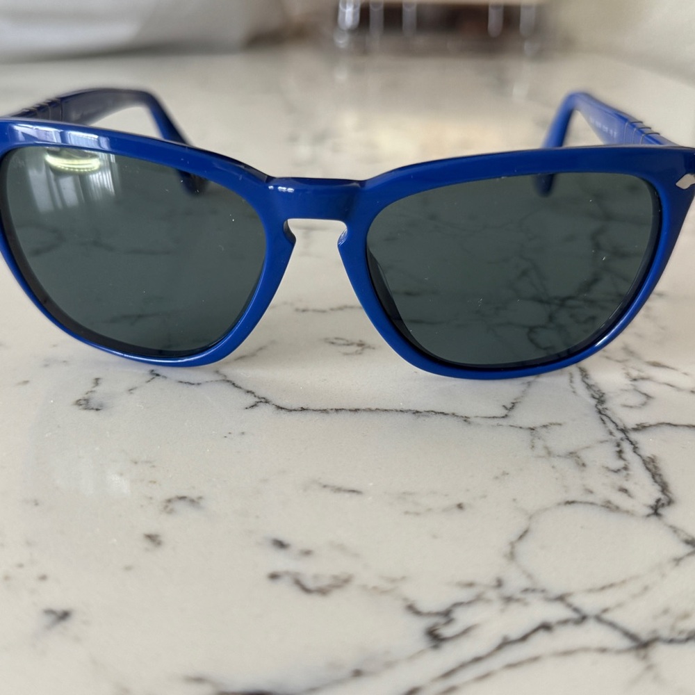 Blue Sunglasses with Dark Lenses
